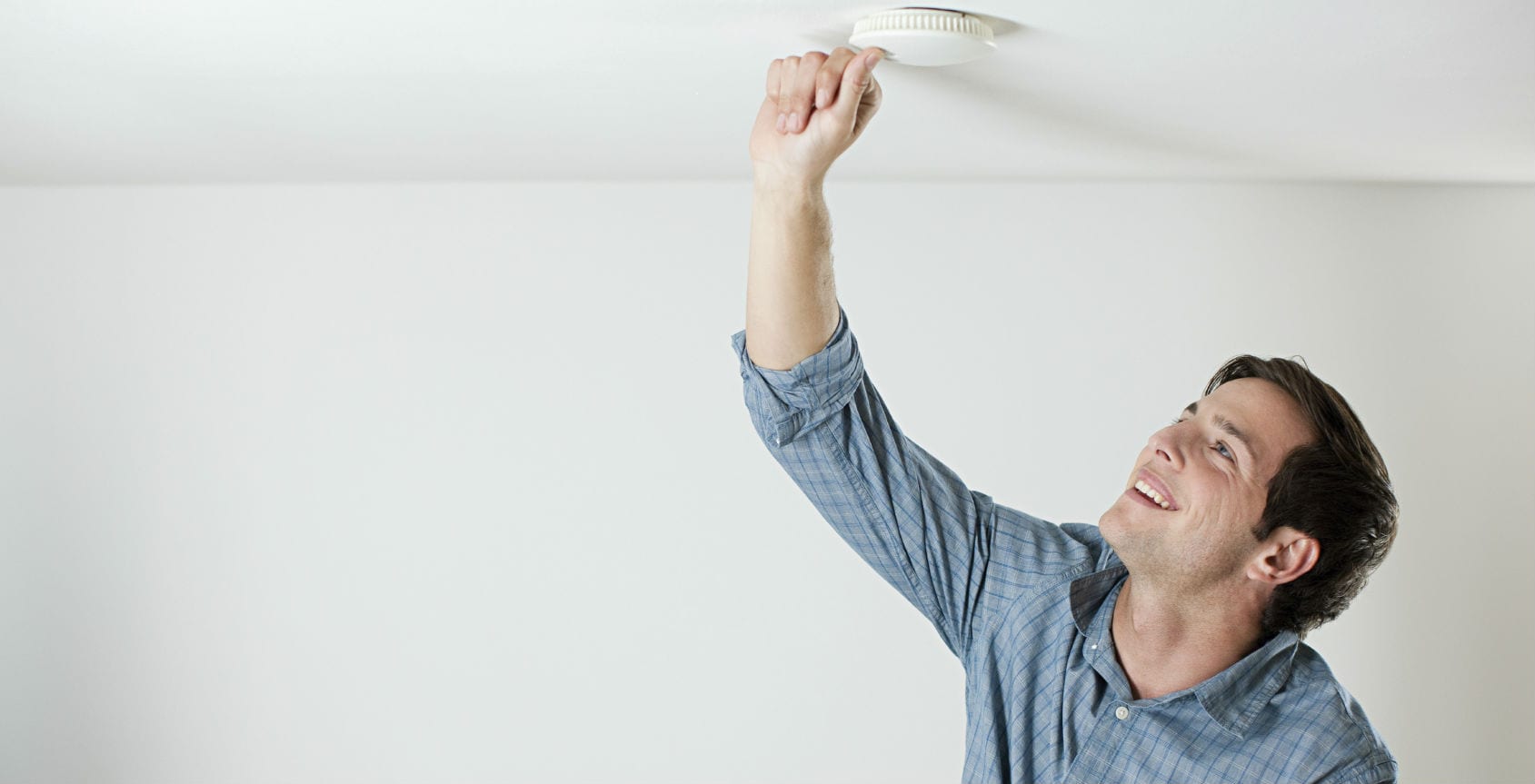 Testing the smoke alarm in important for national fire safety month.